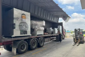 Strip edge trimming line and oscillating winder modules loaded for export